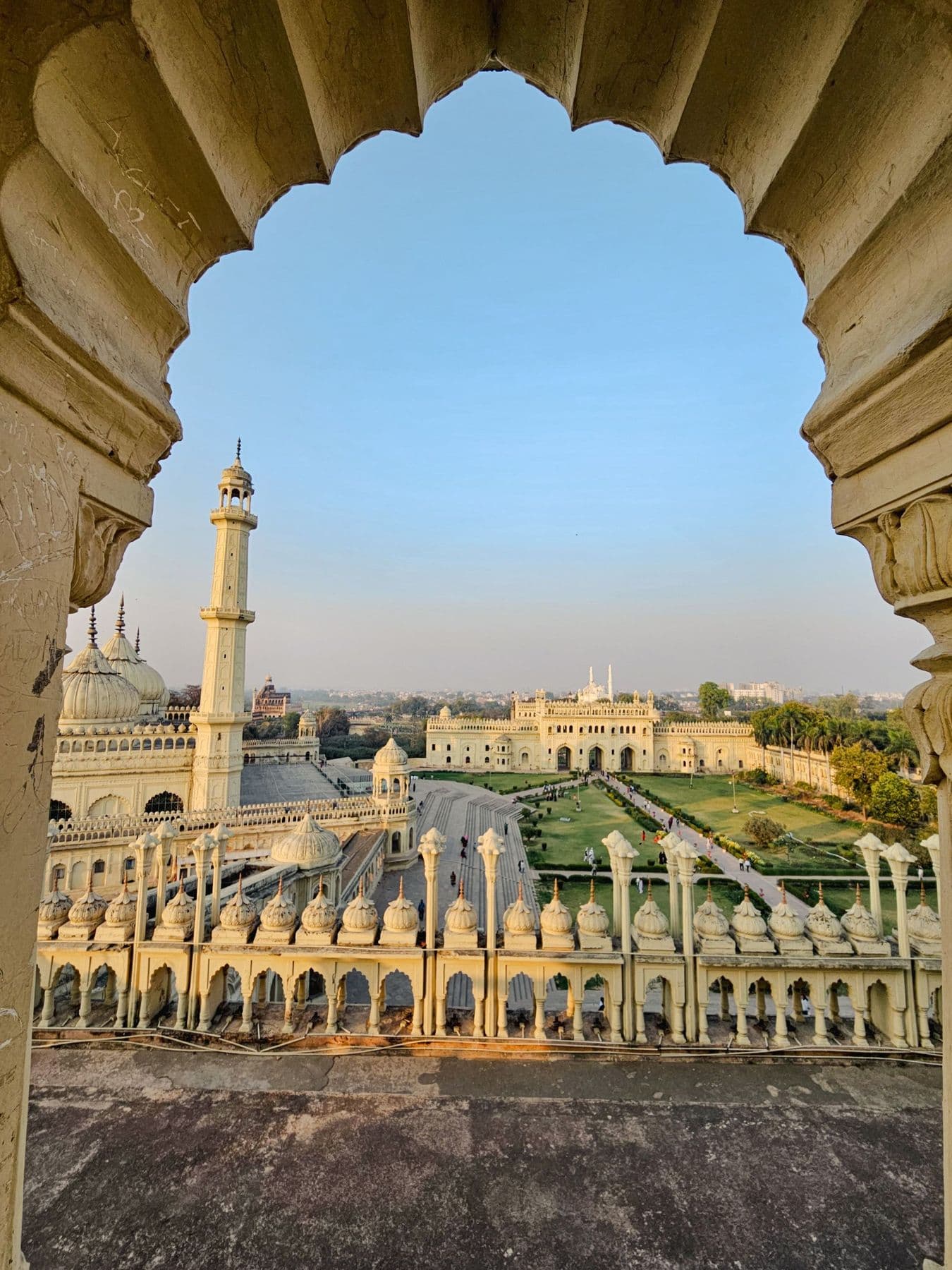 Bara Imambara seen through a carved arch in Lucknow